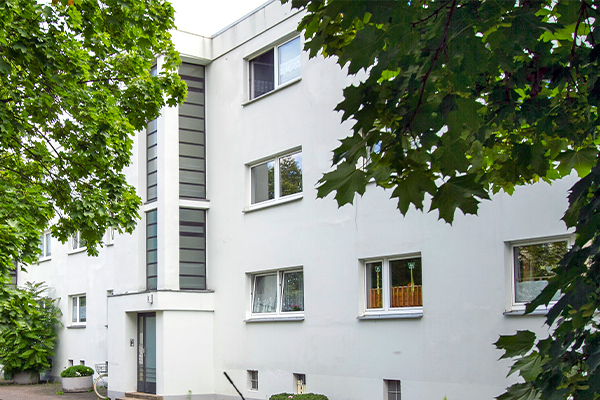 Ein weißes Haus names St.-Georg-Garten Block I - VI in Celle